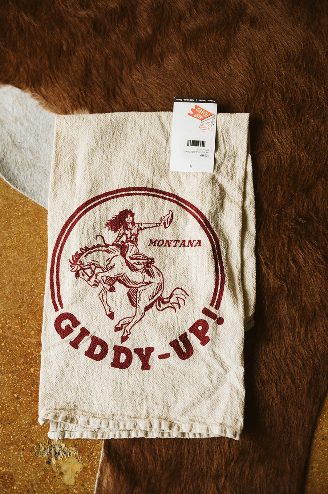 INK BUCKING GAL TOWEL