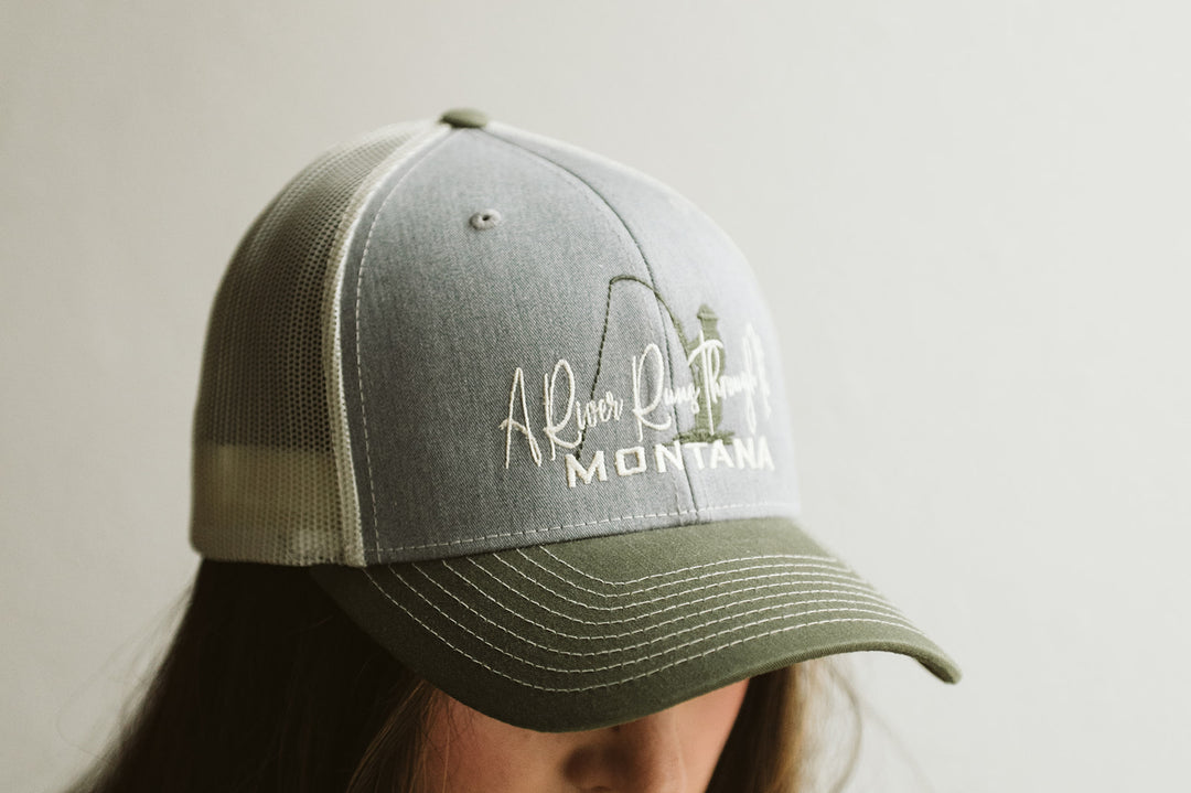 RIVER RUNS GREY/GRN TRUCKER HAT